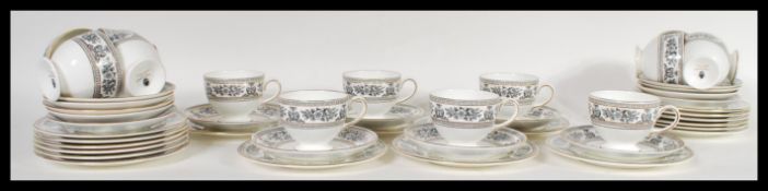A 20th Century Wedgwood tea service in the Black Columbia pattern to include tea cups, saucers and