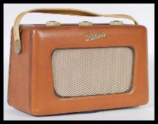 An early 20th century century vintage R300 Roberts transistor radio in the original brown vinyl