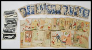 A collection of vintage cigarette cards to include a selection of J. Wix Henry cigarette cards, a