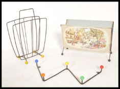 A mid century retro wirework atomic / sputnik magazine rack with multi ball coloured finials