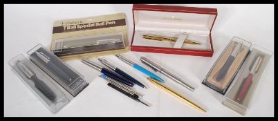 A collection of boxed Parker mechanical ball point pens and refill cartridges, along with a boxed