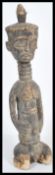 An early 20th Century large African tribal carved wooden male marriage or fertility ancestor figure,
