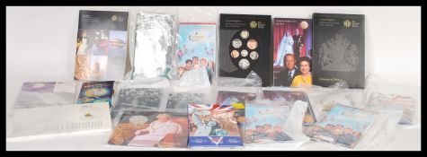 A collection of uncirculated coins, all retaining original cases and appearing to be sealed