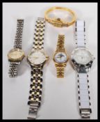 A collection of vintage watches to include a Rotary moonphase examples, bracelet watch etc.