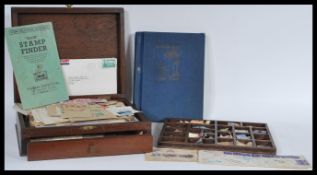 A collection of world stamps dating from the early 20th Century to include Indian, Canadian, Great