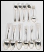 A group of six early 19th century silver hallmarked teaspoons, most being fiddle style and
