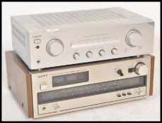 A retro 20th Century Sony amplifier Model No TA-FE370 together with a sony AM-FM radio receiver