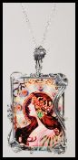 A sterling silver and enamel Art Nouveau pendant panel necklace depicting maiden with decorative