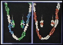 Two demi parure sets of ladies jewellery to include a necklace of white baroque pearls with polished