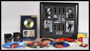 A selection of Cliff Richard collectable items to include limited edition framed film cells,