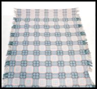 A superb 20th century retro vintage welsh blanket having a vibrant blue ground with repeating