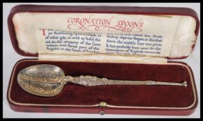 A silver hallmarked Coronation Anointing spoon bearing London hallmarks complete in the case. 17cm