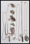 A collection of silver necklaces, chains and pendants, to include various styles of chains, twist,