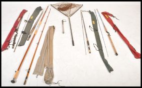 A collection of vintage 20th Century Abu fishing rods to include both course and sea fishing rods,