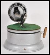 A rare and unusual vintage retro 20th Century small portable gramophone record player having brushed