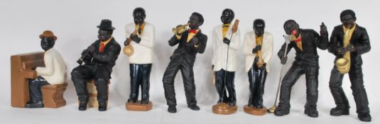 A collection of vintage Jazz band figurines, to include trumpet player, saxophone, singers,