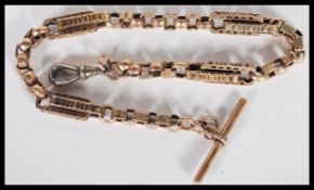 A 9ct gold Victorian Albert chain with lozenge shaped spacers, t-bar and lobster clasp. 14