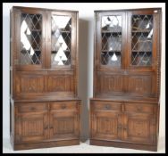 A pair of Jaycee bookcase / cocktail cabinets, two