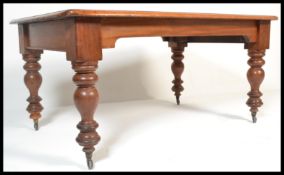 A 19th Century Victorian mahogany library table, inset red leather gilt tooled skiver,  circa