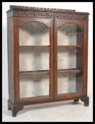 A late 19th century Victorian glazed bookcase / di