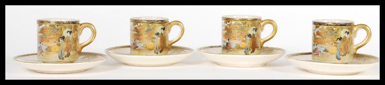 A matching set of four 19th century Oriental Meiji period Japanese Satsuma coffee cups / cans and