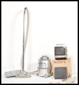 A vintage retro Sony 9-90UB black and white portable television in original box with accessories,