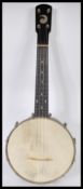 A vintage 20th Century John Grey and Sons four string banjo musical instrument complete in