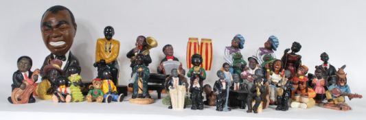 A collection of hand painted figurines of Negro musicians, to include Jazz musicians, gospel