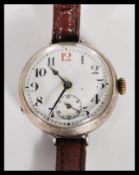 A vintage early 20th Century silver hallmarked gents WW1 era military trench watch having a white