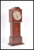 An early 20th Century mahogany miniature grandfather longcase mantel clock having boxwood inlay. The