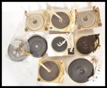 A collection of seven vintage 20th Century record player decks, to include several Garrard decks