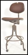 A mid 20th century Industrial machinists - factory chair stool having  original wool seat and