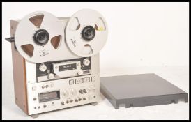 A vintage retro teak cased Sony model No TC 880 - 2 closed loop dual capstan reel to reel /