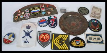 A collection of predominately Russian enamel badges to include many military related ones together