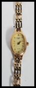 A 20th Century 9ct gold ladies cocktail watch by Rotary, set to a 9ct gold hallmark bracelet.