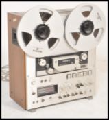 A vintage retro teak cased Sony model No TC 880 - 2 closed loop dual capstan reel to reel /