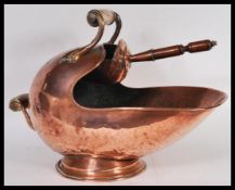 A fantastic 19th Century Victorian Art Nouveau copper coal scuttle having alabaster handle