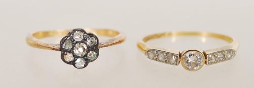 A hallmarked 18ct yellow gold diamond ring, set with a principal round brilliant cut diamond