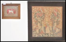 An early 20th Century needlepoint cross stitch embroidery depicting a dog above a checkerboard