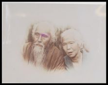 A late 19th Century Victorian hand - tinted albumen print photograph, the mounted studio