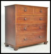 A rare 19th Century Victorian mahogany attic chest of drawers / chest on chest raised on bun feet.