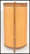 A 19th Century Victorian Aesthetic movement bamboo and wicker basket of cylindrical form having