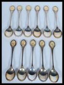 A set of eleven 20th century hallmarked silver commemorative spoons for the Royal Society of