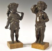 PAIR OF REGENCY SIENNA MARBLE AND BRONZE PUTTI STA