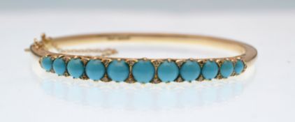 A hallmarked 14ct gold, turquoise and diamond half