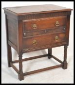 An Edwardian oak Jacobean revival chest of drawers