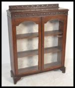 A late 19th century Victorian glazed bookcase / di