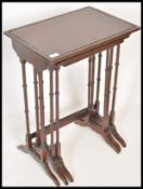 A pair of 19th Century Victorian mahogany nest of three tables having boxwood inlay decoration