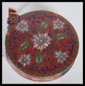 An early 20th Century Chinese enamel cloisonne magnifying glass / loop. The enamel on copper