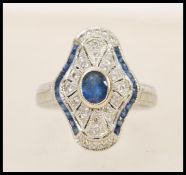 A 1920's 18ct white gold art deco panel ring set w